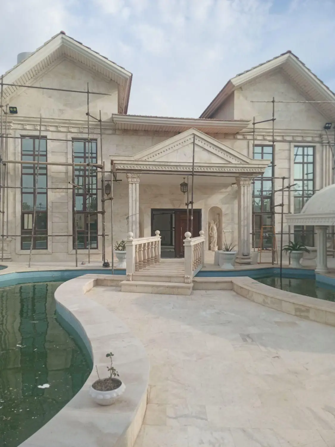 پیچ ورولپلاک سنگ نما با داربست تمام نقاط